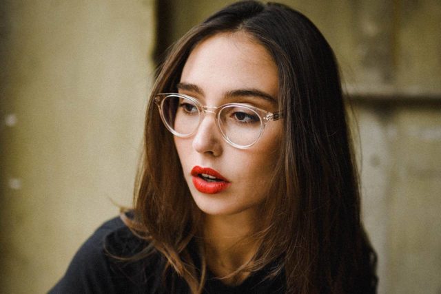 woman clear frames red lips 1280x853.jpg