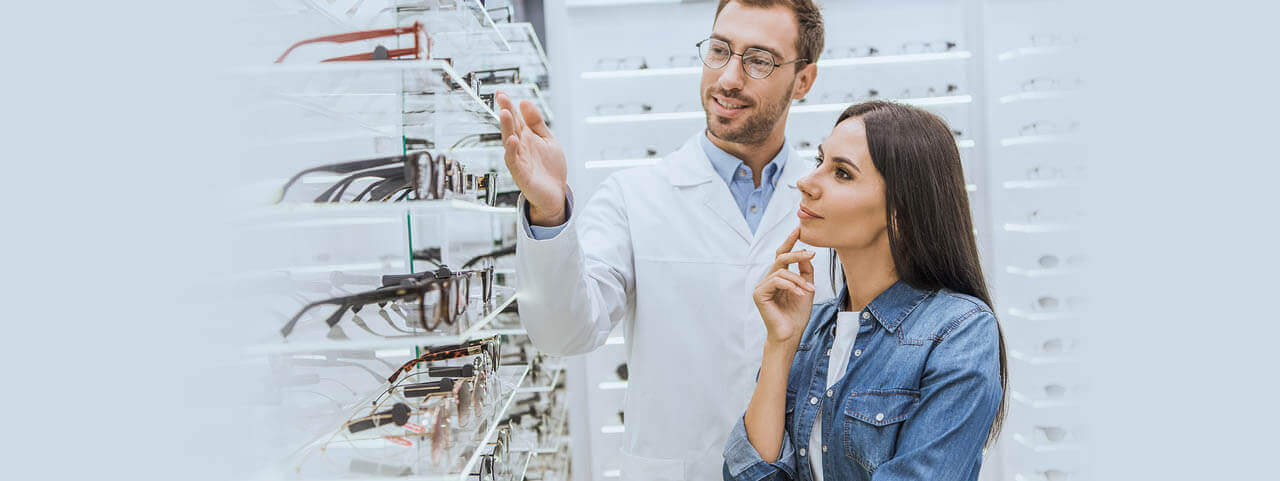 Staff Optometrist Choosing Glasses 1280x480.jpg