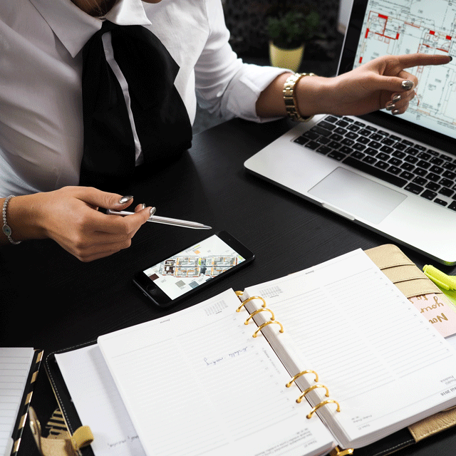 Insurance FAQs, open laptop and notebook