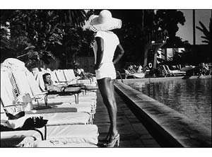 Anthony Friedkin, <em>Woman by the Pool</em>, 1975. Silver gelatin print, 16 x 20 in. Coutesy Stephen Cohen Gallery, Los Angeles.