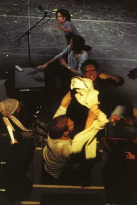 The Wooster Group, <em>Poor Theater (Epilog)</em>, 2006. Directed by Elizabeth LeCompte. Pictured: Scott Shepherd, Sheena See, Kate Valk, Ari Fliakos. Photo: Paula Court. The Wooster Group, <em>Poor Theater (Epilog)</em>, 2006. Directed by Elizabeth LeCompte. Pictured: Scott Shepherd, Sheena See, Kate Valk, Ari Fliakos. Photo: Paula Court.
