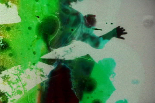 Jennifer West, <em>Nirvana Alchemy Film, (16 mm black & white film soaked in lithium mineral hot springs, pennyroyal tea, doused in mud, sopped in bleach, cherry antacid and laxatives - jumping by Finn West & Jwest)</em>, 2007. 2 min, 51 sec. Jennifer West, <em>Nirvana Alchemy Film, (16 mm black & white film soaked in lithium mineral hot springs, pennyroyal tea, doused in mud, sopped in bleach, cherry antacid and laxatives - jumping by Finn West & Jwest)</em>, 2007. 2 min, 51 sec.