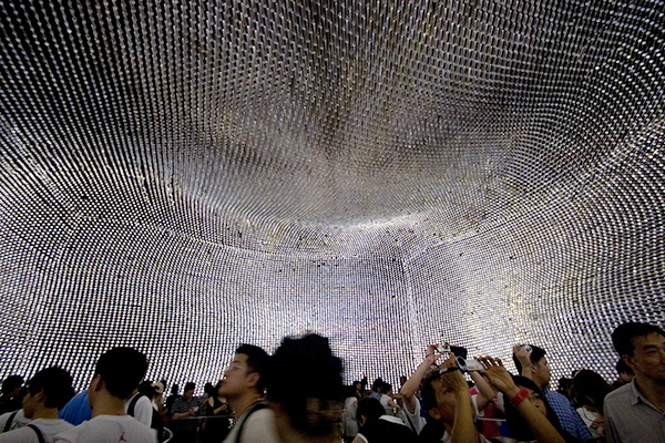 Interior of the UK Pavilion, designed by Thomas Heatherwick. 60,000 fiberoptic acrylic rods embedded with unique seeds from the Kew Gardens seed bank in London. Interior of the UK Pavilion, designed by Thomas Heatherwick. 60,000 fiberoptic acrylic rods embedded with unique seeds from the Kew Gardens seed bank in London.