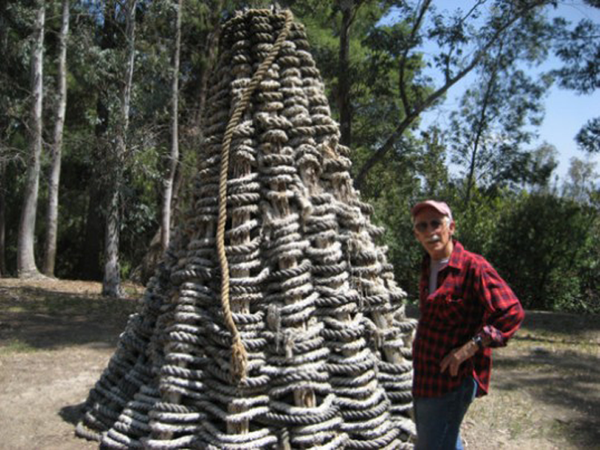 Lloyd Hamrol and his sculpture <em>Woven Cone</em> (1973) at California Institute of the Arts, Valencia, California on May 22, 2007. Photo by the author. Lloyd Hamrol and his sculpture <em>Woven Cone</em> (1973) at California Institute of the Arts, Valencia, California on May 22, 2007. Photo by the author.