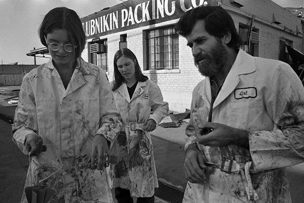 Allan Kaprow (right), Bia Lowe and an unidentified student, in <em>Maps</em>, 1973. Photo: Susan Mogul. Courtesy of Suzanne Lacy.