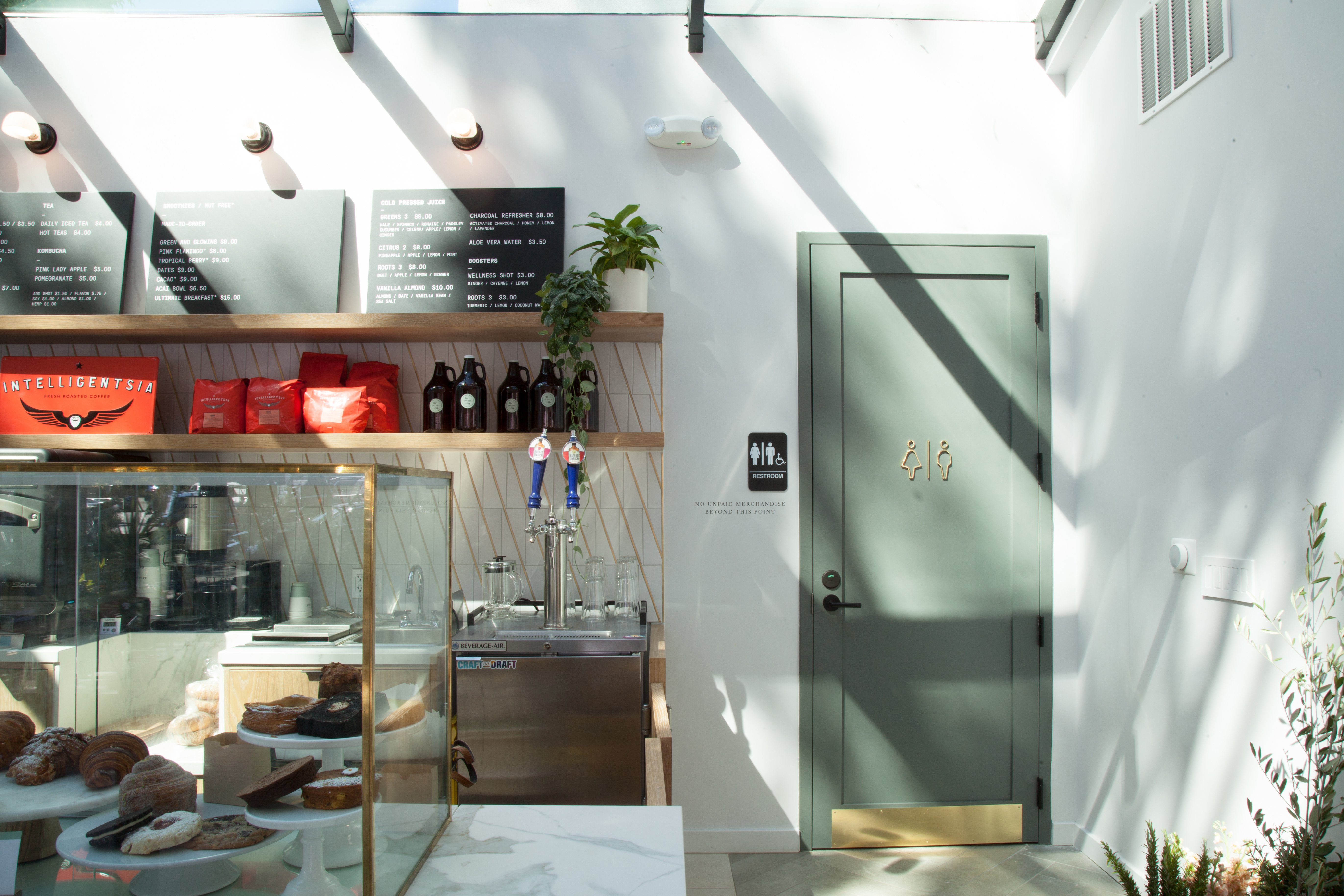 2018_Q3_image_commercial_design_Project_M_Plus_Jaydes_Market_grocery_store_cafe_backsplash_tile_scalene_triangle_stacked_brass_inlay_daisy_FC-185726.jpg