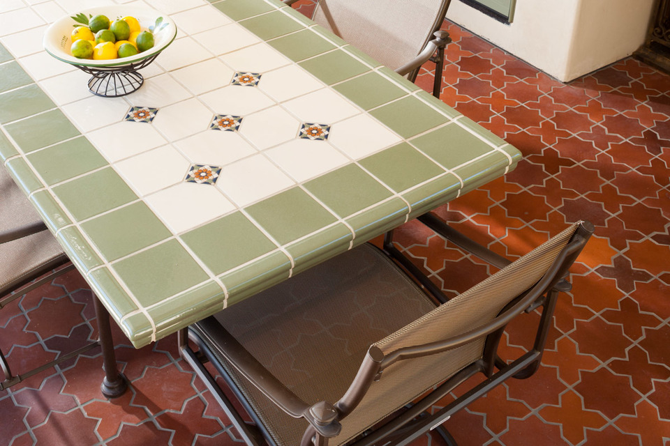 classic cuerda seca cross pattern outdoor table design inspiration