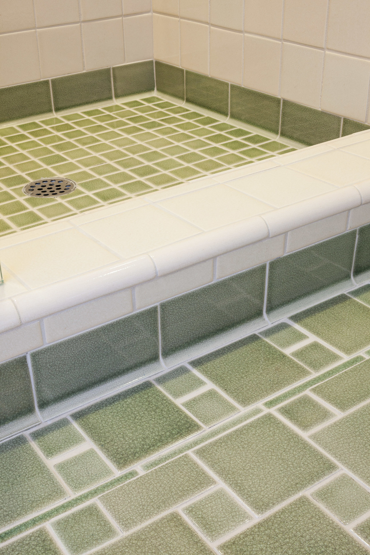 green and white bathroom shower tile