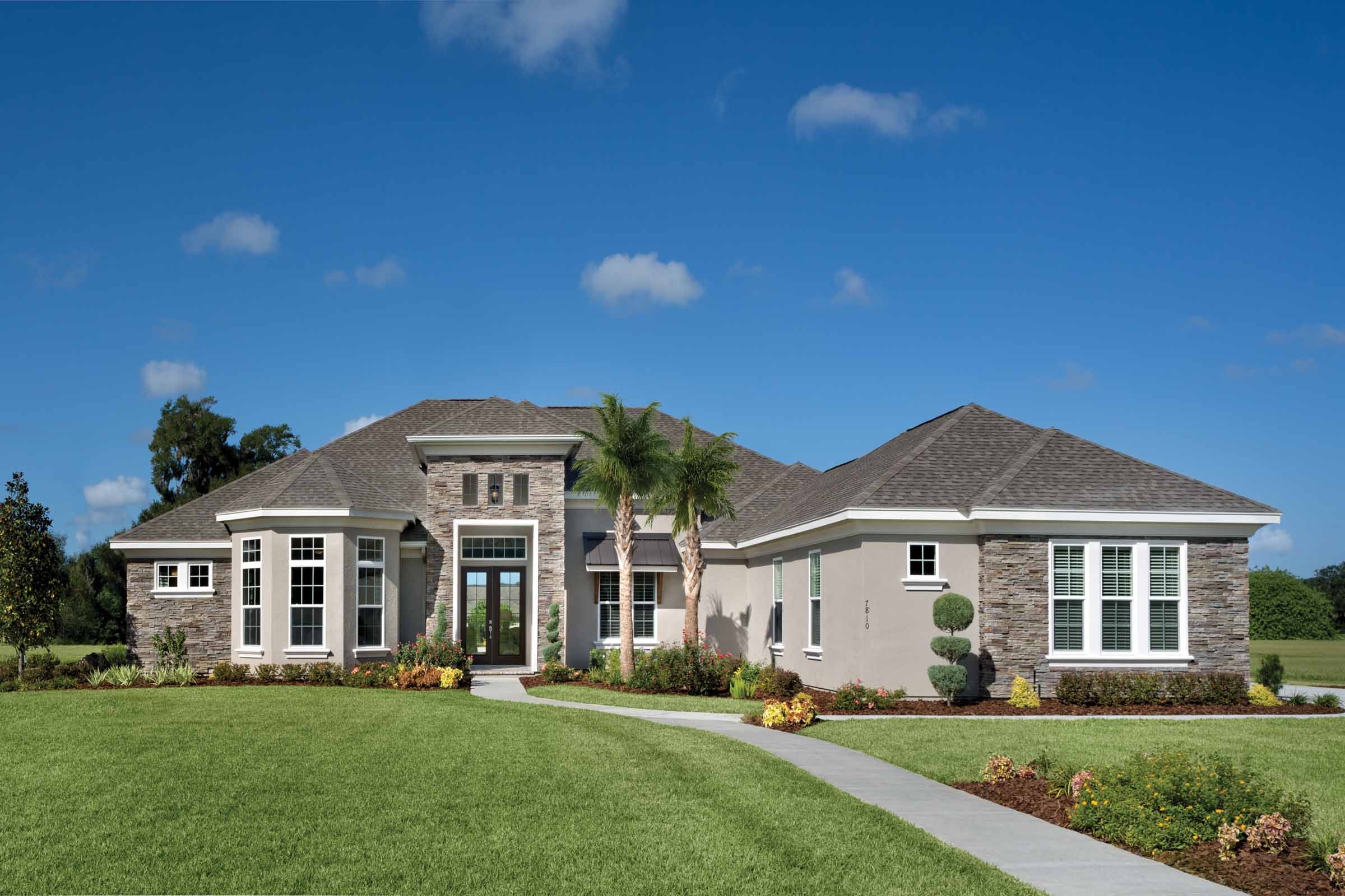 Stacked stone makes a bold statement on the elevation of a