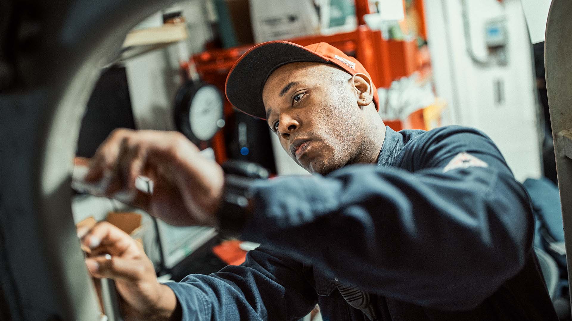 Sidney Wilson measuring for a repair