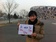 holding-a-sign_ws_1357574367