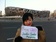 holding-a-sign_ws_1357912474