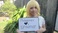 holding-a-sign_ws_1358053807