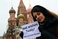 holding-a-sign_ws_1358076047