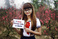 holding-a-sign_ws_1370557818