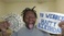 holding-a-sign_ws_1360348045