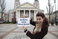holding-a-sign_ws_1360764145