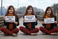 holding-a-sign_ws_1361709992