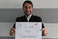 holding-a-sign_ws_1361799532
