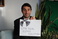 holding-a-sign_ws_1364144026