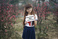 holding-a-sign_ws_1368525398