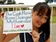 holding-a-sign_ws_1370904136