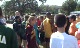 HS kids around Hassan after his race