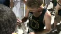 Galen Rupp signing autographs after his 10K win