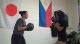 Cassie hitting mitts