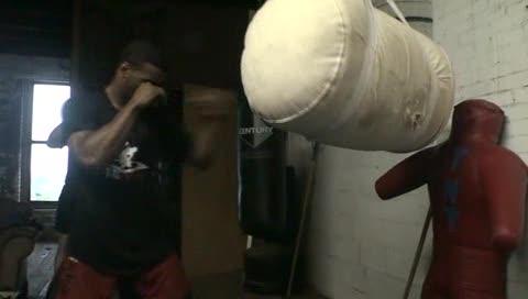 Woodley hitting bag