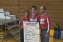James with Mom and Dad after finals match