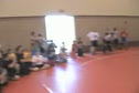 Team mates get behind there friend when he's wrestling