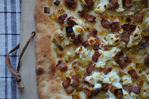 Leek, bacon, and goat cheese pizza
