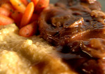 Hunter's Veal Chop with Southern Cheese Grits: Jaegerschnitzel with Southern Cheese Grits Recipe