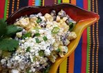 Roasted corn (esquites) with black beans, lime dressing and queso Cotija Recipe