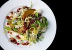Roasted Pear Salad with Endive, Pomegranate, Blue Cheese, and Hazelnut Vinaigrette Recipe