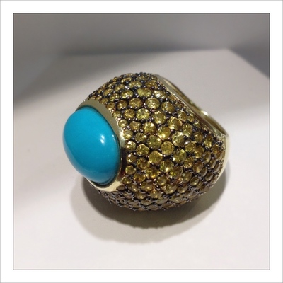 Finished 18k yellow gold, 17 carats in yellow sapphires and turquoise
