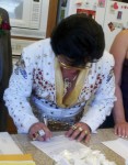 Bay Area Elvis Rick Torres signing wedding certificate Bay Area Elvis Rick Torres signing wedding certificate