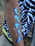 Big Grins - Name body painting and face painting design Big Grins - Name body painting and face painting design