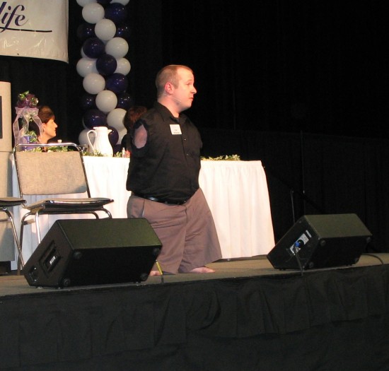 Chet, singing at the end of a presentation.
