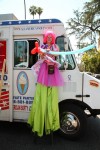 Stilt walking clowns and fairies