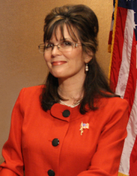 Patsy Gilbert as Sarah Palin