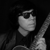 Mike Greenwood as Roy Orbison - Singing Guitarist in Henderson, Nevada