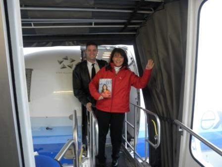 Cecilia and Pilot landing for Colorado Springs Book Tour