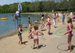 Fun on the beach with Hula Hoops at Clay's Park Resort.