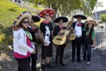 Fans pose with Trio Sol de America