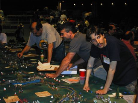 Overview of the Evil side of the table: Herman, Pat, and Mike, all hotly engaged