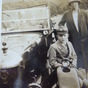 A YOUNG MAN HAS HIS PHOTOGRAPH TAKEN