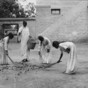 sweeping leaves 1910 India