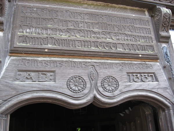 Carving over the front door at Wightwick Manor